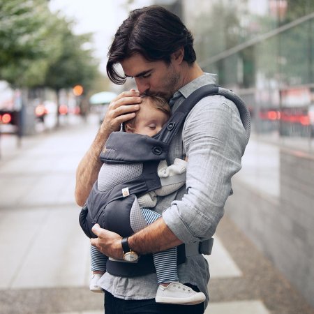 1 year old in baby carrier