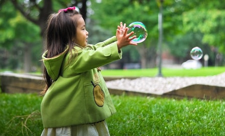 Catching soap bubbles - practicing fine motor skills