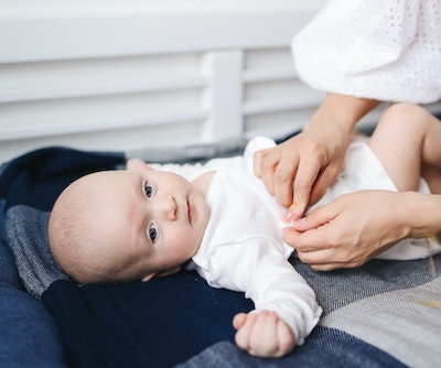 Why Do Baby Onesies Have Overlapping Shoulders